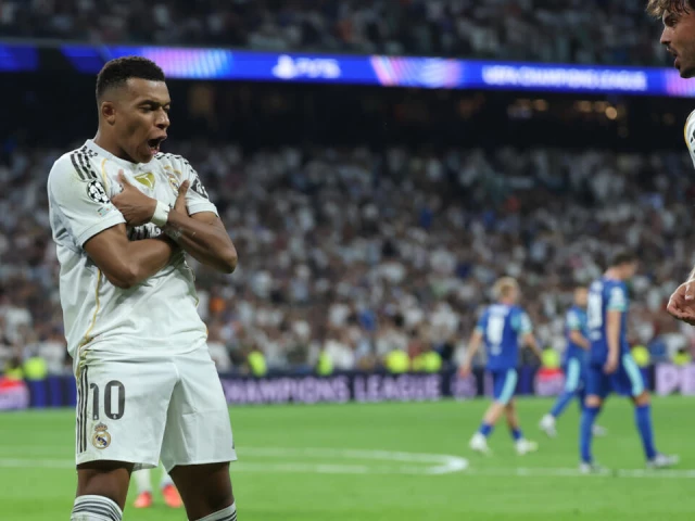 kylian mbappe celebrates his second penalty as real madrid came from behind to beat marseille 2 1 photo afp