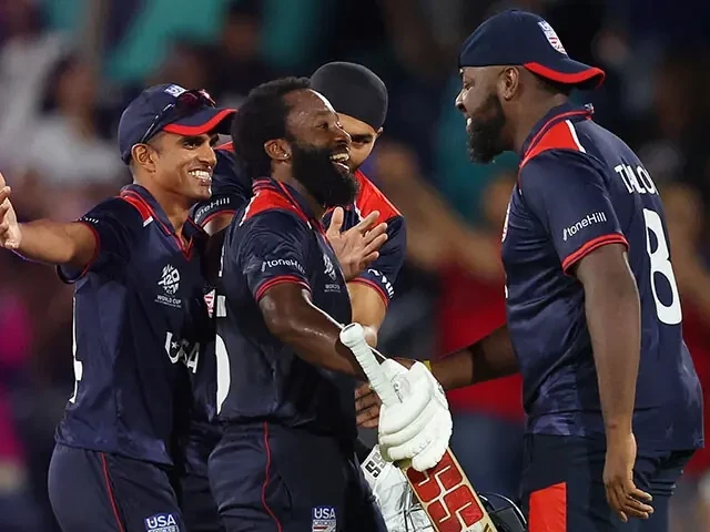 aaron jones of usa celebrates with teammates after winning the icc men s t20 cricket world cup west indies usa 2024 match between usa and canada at grand prairie cricket stadium on june 1 2024 in dallas texas photo afp