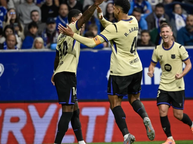 barcelona came from behind to beat real oviedo and stay on real madrid s tail at the top of la liga photo afp