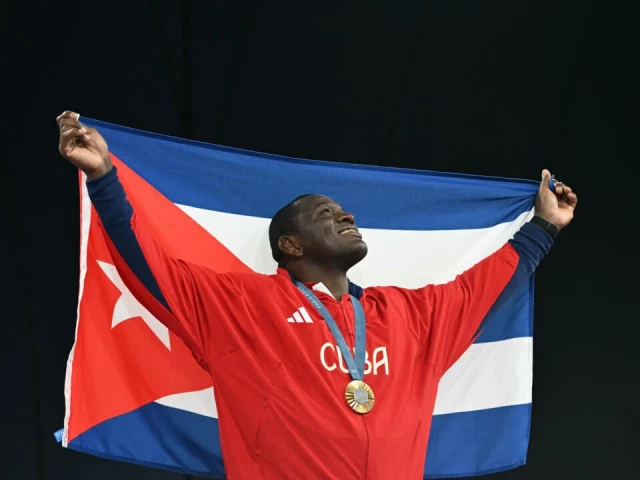 cuban wrestler mijain lopez called for cuban sport to open up to the world to recover its lost glory photo afp