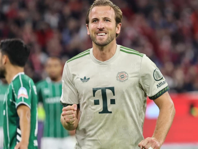 bayern munich s english forward harry kane celebrates scoring his 100th goal for the bundesliga giants photo afp