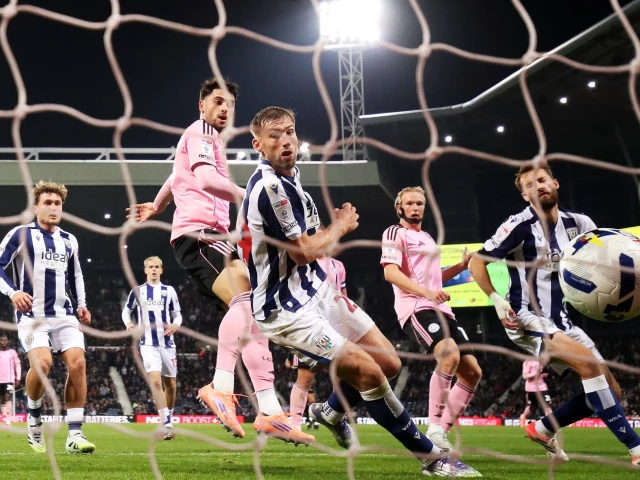 west brom s nat phillips scores an own goal in the 93rd minute to give leicester a point photo afp
