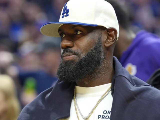 lebron james of the los angeles lakers watches an nba preseason game against golden state from the bench photo afp lebron james of the los angeles lakers watches an nba preseason game against golden state from the bench photo afp