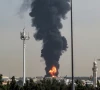 black smoke rising from a strike on an oil depot photo afp
