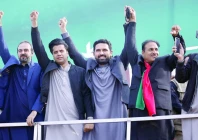 k p chief minister sohail afridi and other party leaders raise hands as they arrive for a pti rally in kohat photo express k p chief minister sohail afridi and other party leaders raise hands as they arrive for a pti rally in kohat photo express