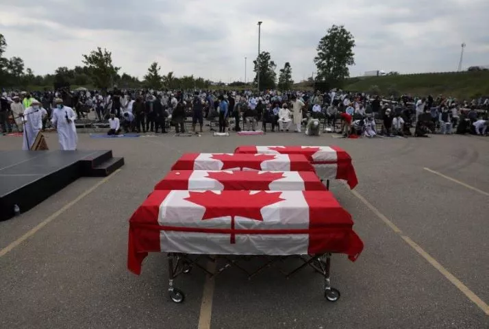 flag wrapped coffins are seen outside the islamic centre of southwest ontario during a funeral of the afzaal family that was killed in what police describe as a hate motivated attack in london ontario canada june 12 2021 reuters carlos osorio flag wrapped coffins are seen outside the islamic centre of southwest ontario during a funeral of the afzaal family that was killed in what police describe as a hate motivated attack in london ontario canada june 12 2021 reuters carlos osorio