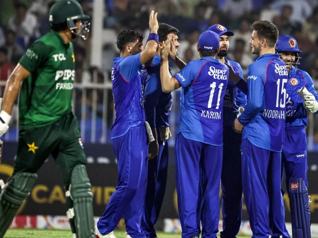 afghanistan s players celebrate after taking the wicket of pakistan s harris rauf l during the t20 international cricket match between afghanistan and pakistan in sharjah on september 2 2025 photo afp afghanistan s players celebrate after taking the wicket of pakistan s harris rauf l during the t20 international cricket match between afghanistan and pakistan in sharjah on september 2 2025 photo afp