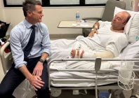 new south wales premier chris minns visits ahmed al ahmed who was identified on social media as the bystander who hid behind parked cars and seized a rifle from one of the gunmen during the deadly shooting at bondi beach on sunday at a hospital in sydney australia december 15 2025 in this picture obtained from social media chrisminnsmp via x via reuters