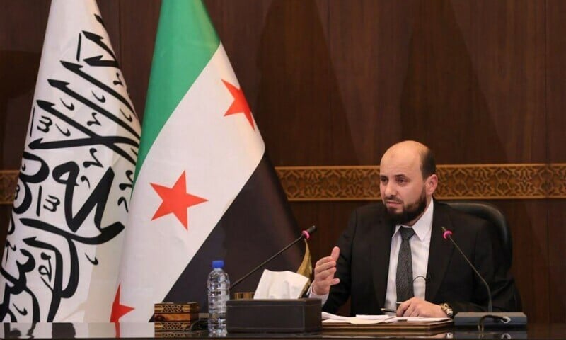 syria s new transitional prime minister mohammad al bashir chairing a meeting of the new cabinet in damascus on december 10 2024 photo afp