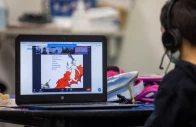 a young student watches dr seuss during a zoom class in los angeles california u s march 2 2021 photo reuters