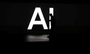 a screen reads ai in reference to artificial intelligence as attendees gather during rivian s first autonomy and ai day showcasing developments in self driving technology in palo alto california us december 11 2025 reuters