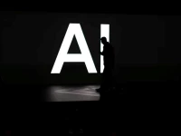 a screen reads ai in reference to artificial intelligence as attendees gather during rivian s first autonomy and ai day showcasing developments in self driving technology in palo alto california us december 11 2025 reuters