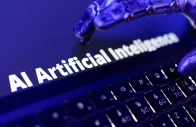 the words ai artificial intelligence a keyboard and a robotic hand are shown in this illustration created on june 5 2026 reuters