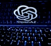 a keyboard is placed in front of a displayed openai logo in this illustration taken february 21 2023 reuters