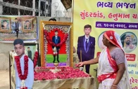 a woman with portrait of her relative died in the air india flight 171 crash last year photo afp