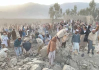afghan men gather at the site of an overnight air strike in girdi kas village of bihsud district of nangarhar province photo afp afghan men gather at the site of an overnight air strike in girdi kas village of bihsud district of nangarhar province photo afp