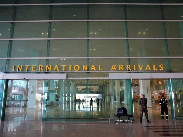 airport security force asf personnel stand guard at the international arrivals of islamabad international airport photo reuters airport security force asf personnel stand guard at the international arrivals of islamabad international airport photo reuters