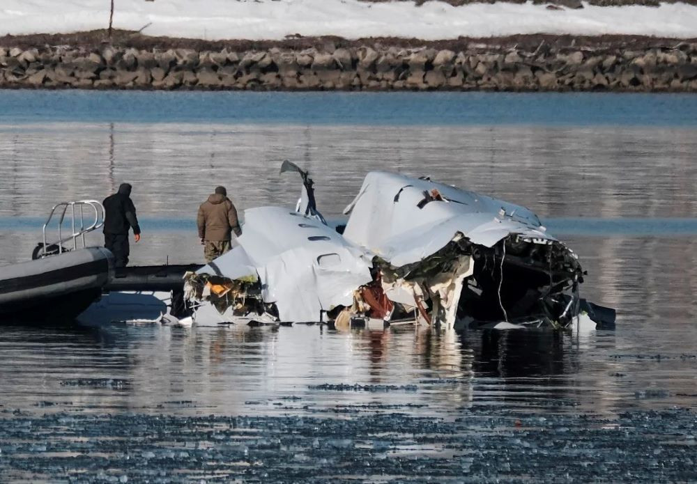 first responders search the crash site of american airlines flight 5342 along the potomac river near ronald reagan washington national airport in arlington va photo npr