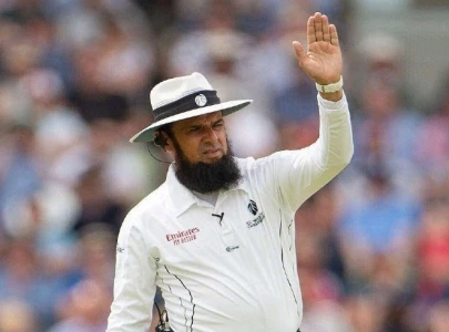 aleem dar reacts after completing 400 international matches