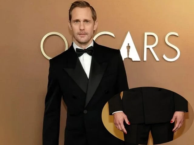alexander skarsg rd turns heads with red nails at governors awards