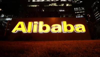 the logo of alibaba group is lit up at its office building in beijing china august 9 2021 reuters