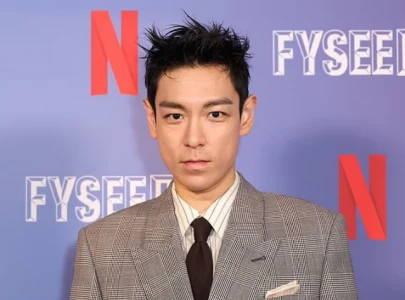 t o p returns to music after 12 years joins hands with squid game creator