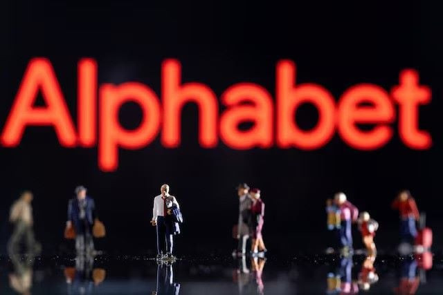 small figurines are seen in front of displayed alphabet logo in this illustration taken february 11 2022 photo reuters small figurines are seen in front of displayed alphabet logo in this illustration taken february 11 2022 photo reuters