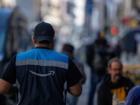 an amazon employee delivers packages in downtown san francisco california us on january 26 photo reuters
