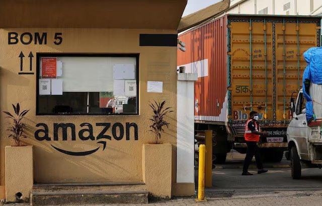 a man inspects trucks before they enter an amazon storage facility on the outskirts of mumbai india october 1 2021 picture taken october 1 2021 photo reuters a man inspects trucks before they enter an amazon storage facility on the outskirts of mumbai india october 1 2021 picture taken october 1 2021 photo reuters