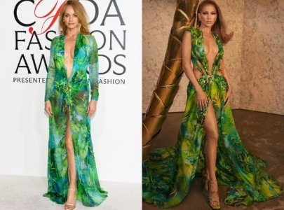 she wore it first amber valletta reclaims the jungle dress that jlo made famous