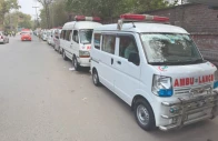 ambulances await patients in a queue outside a hospital in lahore photo express