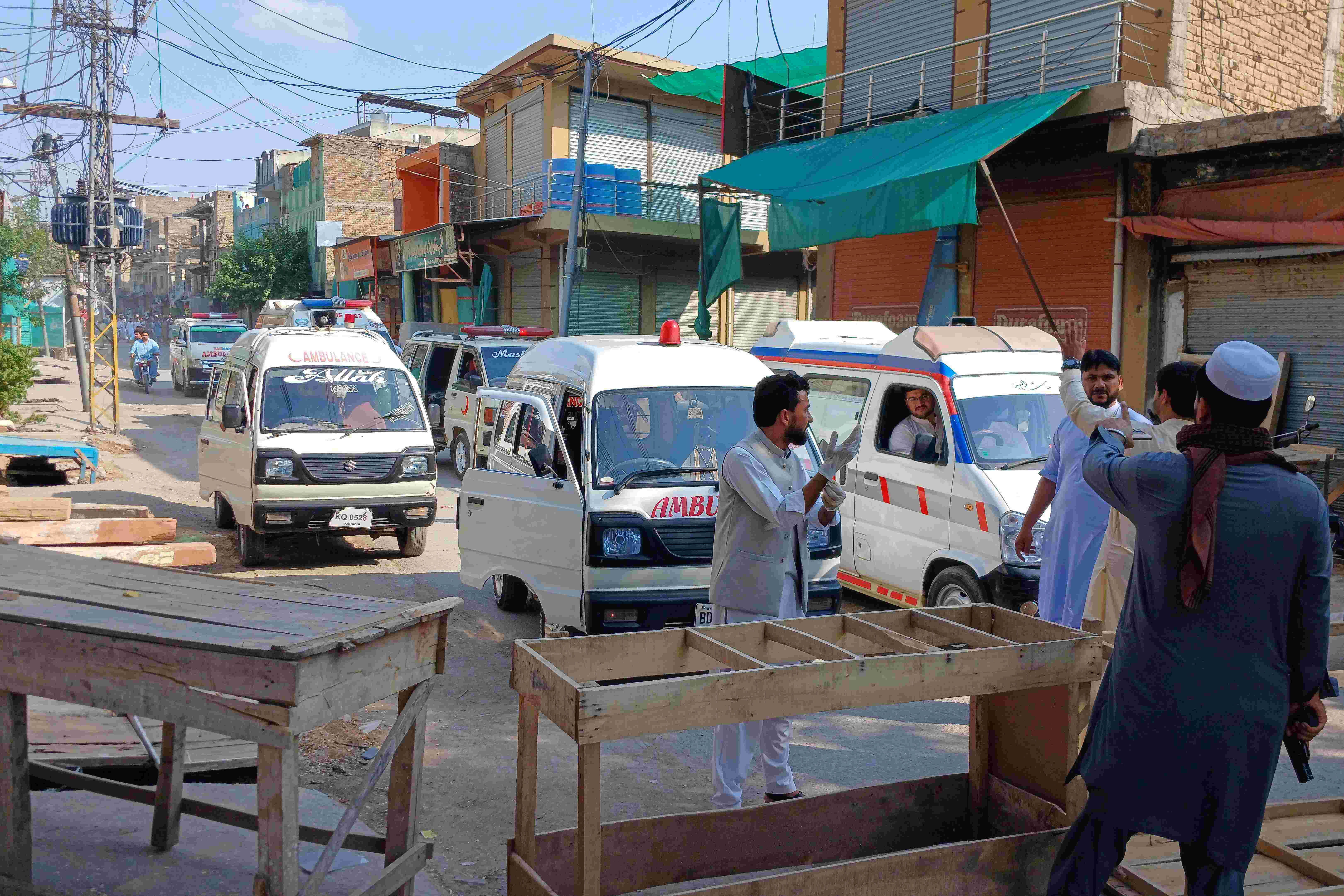 Ambulances are seen at the site of an explosion near the police headquarters in Kohat in Pakistan's Khyber Pakhtunkhwa province on September 18, 2026. Photo: AFP