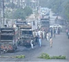 enraged protesters torched multiple dumpers on rashid minhas road after a fatal dumper bike collision photo file online