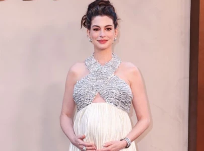 anne hathaway s d23 moment goes viral after fan interrupts her to ask about baby s gender anne hathaway s d23 moment goes viral after fan interrupts her to ask about baby s gender