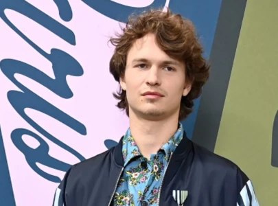 ansel elgort spotted in nyc with partner and baby in first public family photos