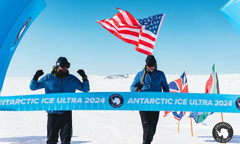 paul johnson and rob sembiante cross the finish line of the antarctic ice ultra marathon race in antarctica on november 8 photo reuters via facebook