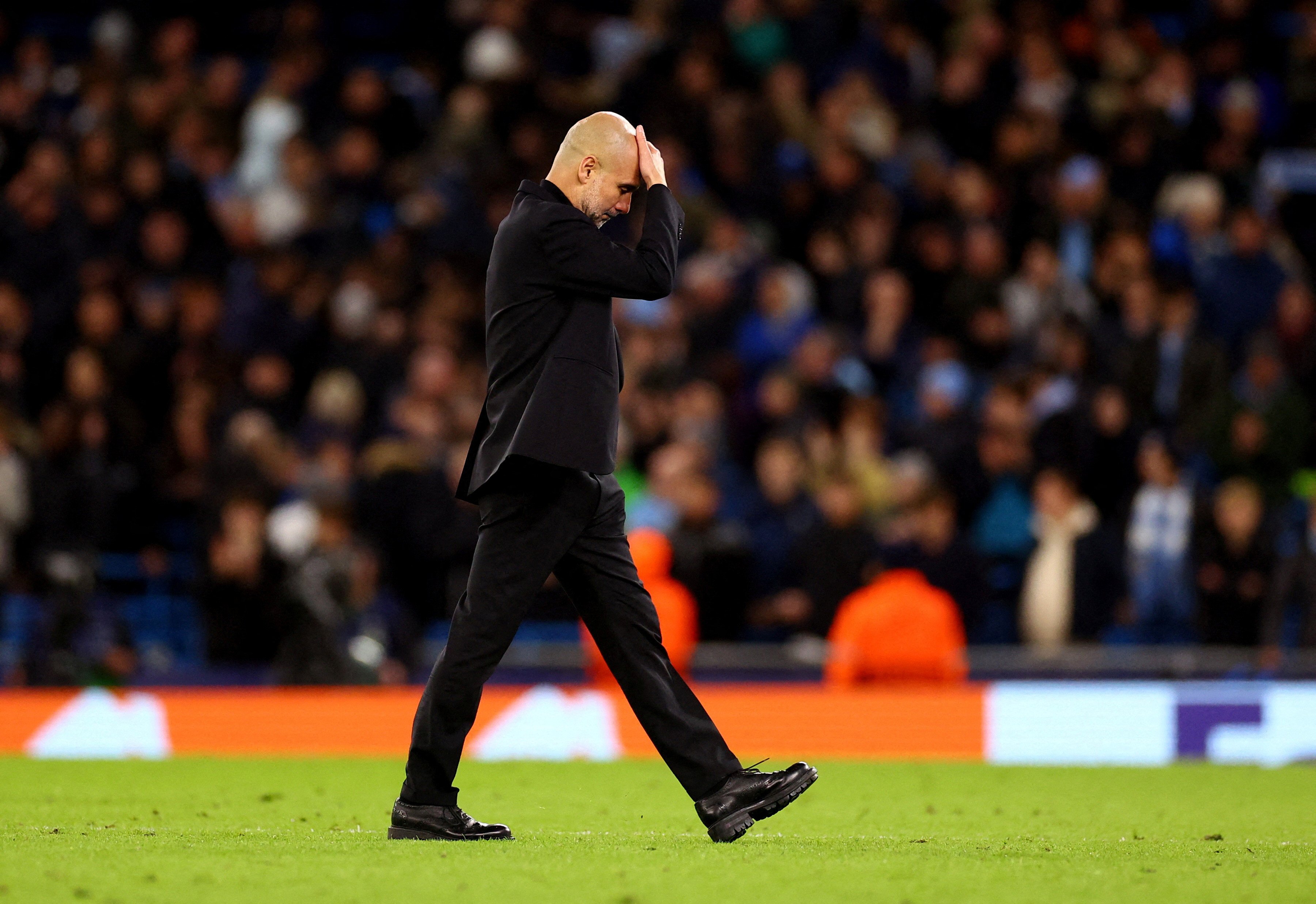 dream theatre manchester city manager pep guardiola looks dejected after losing the penalty shootout in the uefa champions league quarterfinal second leg against real madrid at etihad stadium manchester photo reuters
