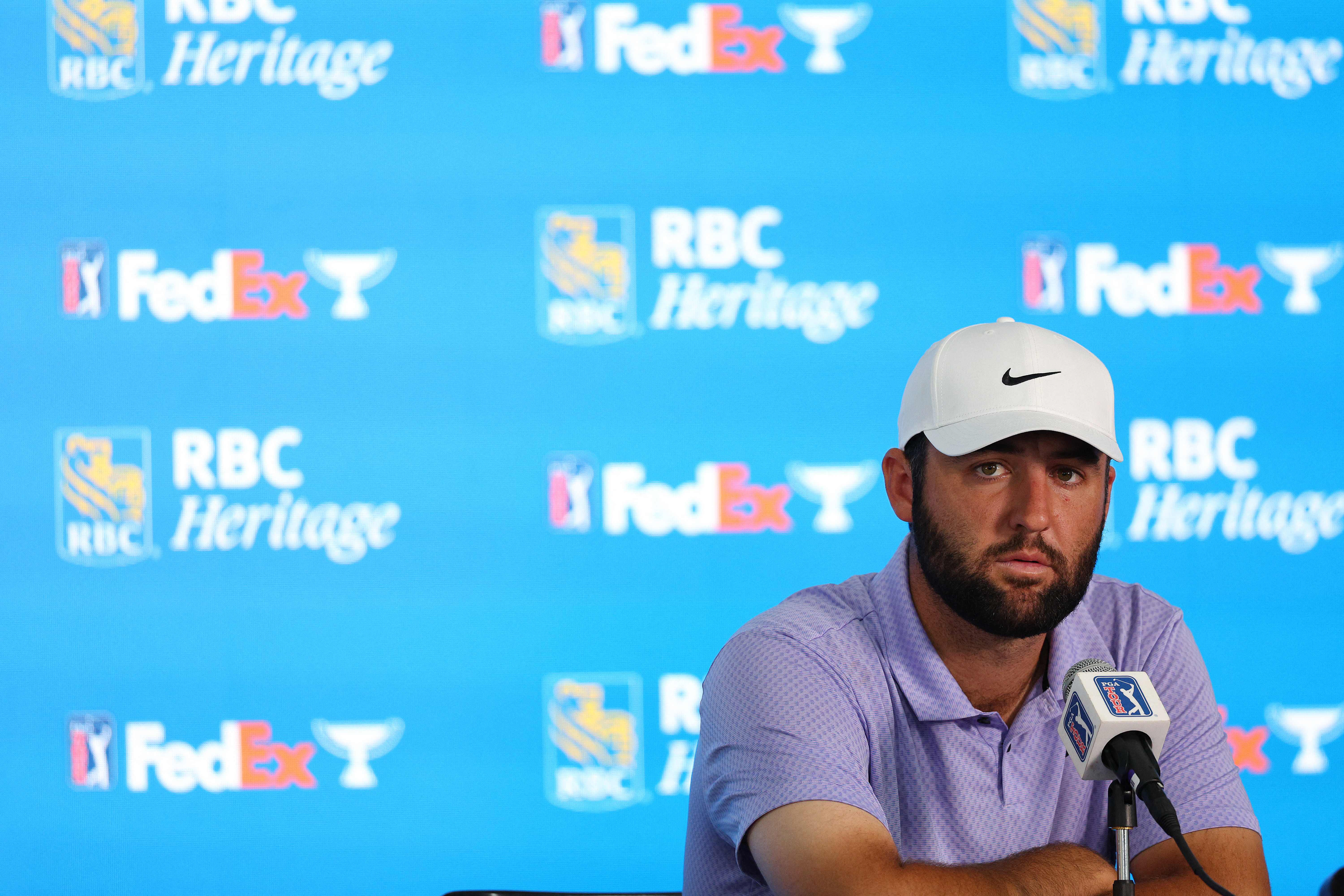 distinction us golfer scottie scheffler attends a press conference following the pro am prior to the rbc heritage at harbour town golf links on april 17 2024 in hilton head island south carolina photo afp