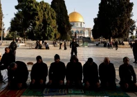 palestinian men pray at al aqsa mosque also known to jews as the temple mount as israeli security forces take position at the compound while tension arises during clashes with palestinians in jerusalem s old city april 5 2023 reuters