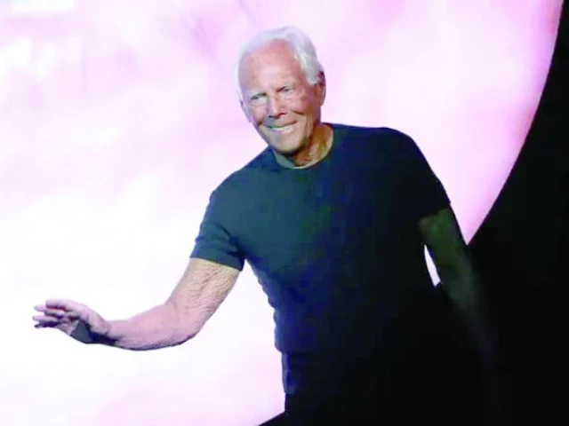 armani usually appears at the end of his shows as pictured here in milan last year photo file