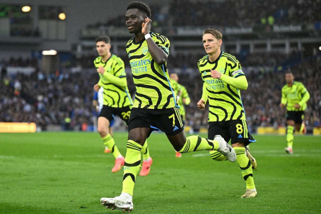 arsenal return to premier league summit as man city cruise