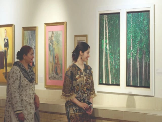 visitors at the a moment in time exhibition featuring three talented artists admire the different artworks each had done to capture the themes of time history and nostalgia the exhibition is currently open at the pnca islamabad photo zafar raja express visitors at the a moment in time exhibition featuring three talented artists admire the different artworks each had done to capture the themes of time history and nostalgia the exhibition is currently open at the pnca islamabad photo zafar raja express