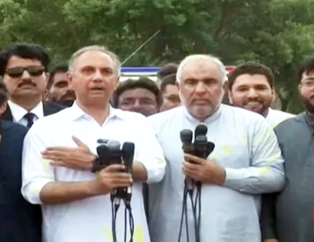 former na speaker asad qaiser addressing a news conference outside rawalpindi s adiala jail alongside the party s secretary general omar ayub khan and others on thursday screengrab