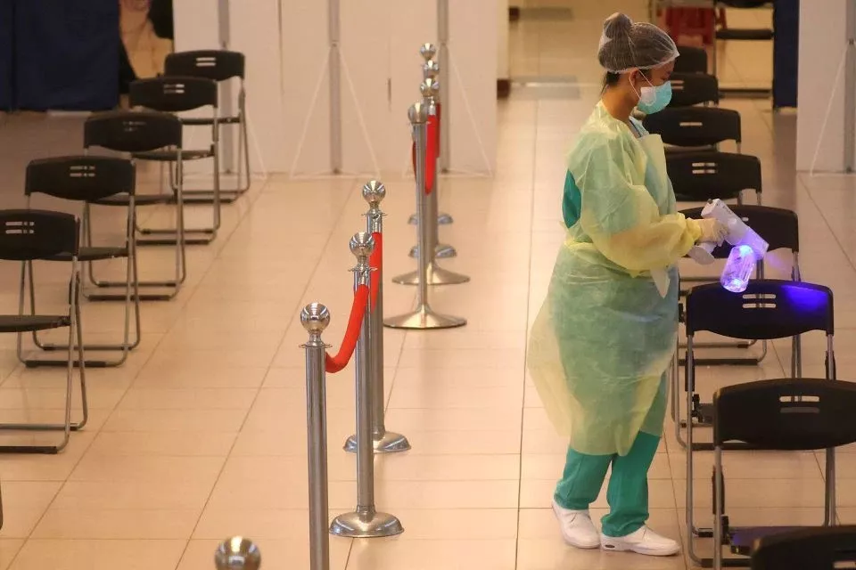 a medical worker disinfects the chairs after people received a dose of the astrazeneca vaccine against the coronavirus disease covid 19 during a vaccination session for elderly people over 75 years old at a stadium in new taipei city taiwan june 25 2021 photo reuters a medical worker disinfects the chairs after people received a dose of the astrazeneca vaccine against the coronavirus disease covid 19 during a vaccination session for elderly people over 75 years old at a stadium in new taipei city taiwan june 25 2021 photo reuters