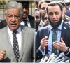defence minister khawaja asif l and information and broadcasting minister attaullah tarar r photos file