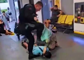 protest erupts after uk cops filmed assaulting pakistanis at manchester airport