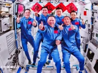 this image captured at beijing aerospace control center on may 25 2026 shows a group picture of the crew of shenzhou 21 and shenzhou 23 spaceships photo xinhua
