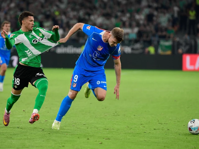 atletico madrid s alexander sorloth r tussles with real betis defender nelson deossa during the spanish league match at the cartuja stadium in seville on october 27 2025 photo afp atletico madrid s alexander sorloth r tussles with real betis defender nelson deossa during the spanish league match at the cartuja stadium in seville on october 27 2025 photo afp
