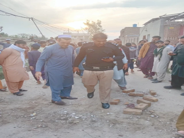 a police official inspects the blast site in peshawar photo express a police official inspects the blast site in peshawar photo express