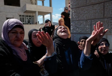 mourners react during the funeral of three palestinians who were killed in an israeli settler attack in the village of abu falah near ramallah in the israeli occupied west bank march 8 2026 photo reuters